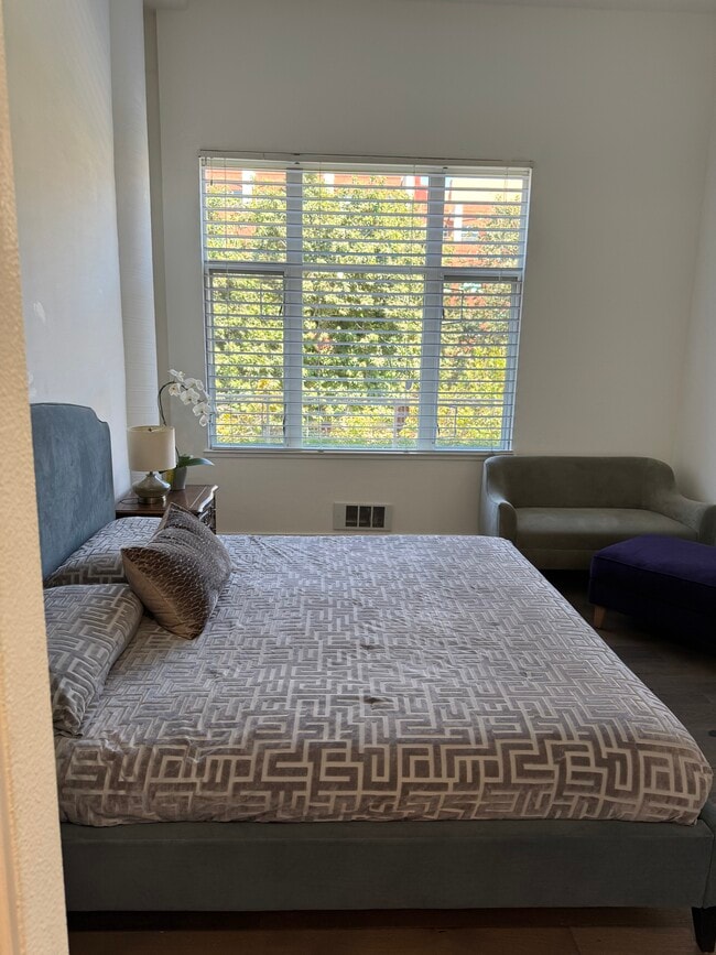 Master bedroom - 5855 Horton St Apartment
