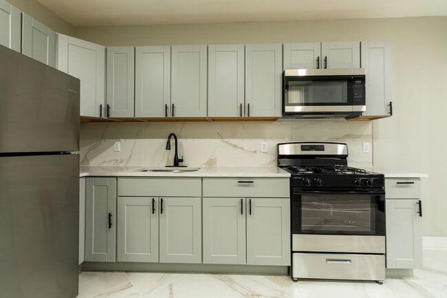 Foto del edificio - Spacious 3-Bedroom Single-Family Row Home ...