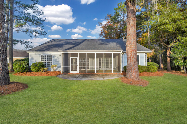 Rear of house overlooking golf course - 61 Crescent Plantation