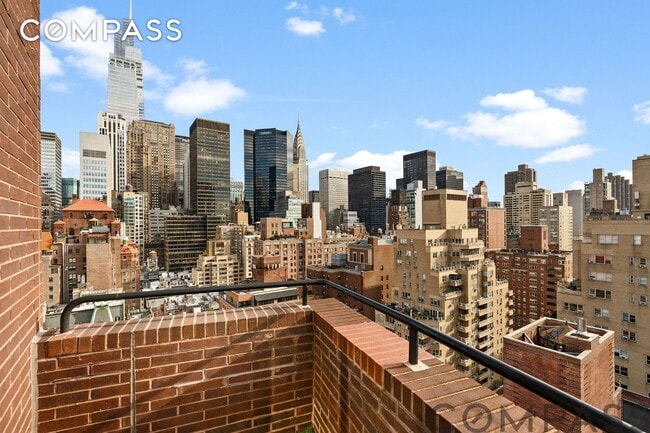 Building Photo - A Sky-High Duplex - Sunlit Sanctuary Above Madison Avenue