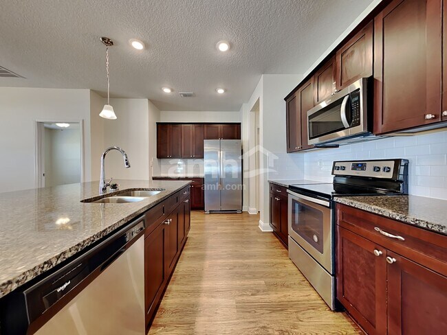 Building Photo - 902 Sunny Stroll Drive