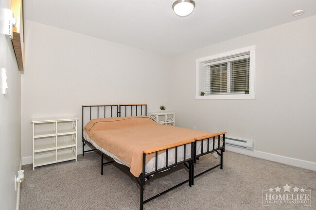 Building Photo - 2 - Bed + 1 - Bath Basement Suite for Rent...