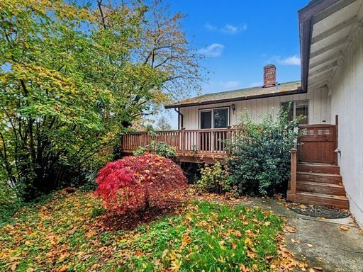 Building Photo - AVAILABLE NOW! Charming West Seattle Home featuring a garage, spacious deck, and wood-burning fir...