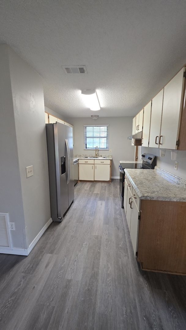 Foto del edificio - Palm Coast 4 Bedroom 2 Bath in the W Section