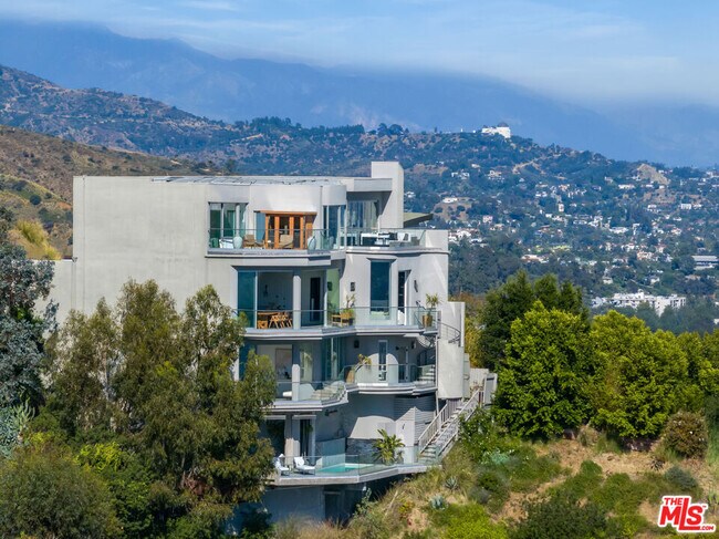 Building Photo - 8572 Hillside Ave