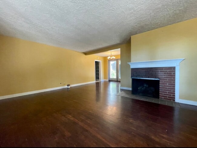 Building Photo - Updated Ranch with Large Fenced Yard, Tucked Off Walker Road~ Gas Fireplace~ Great Natural Light~...