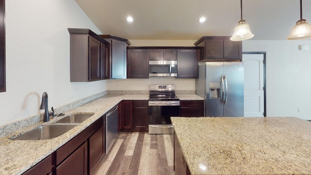 Primary Photo - Stylish Living in a 3-Bed, 2-Bath Townhome with a 2-Car Garage