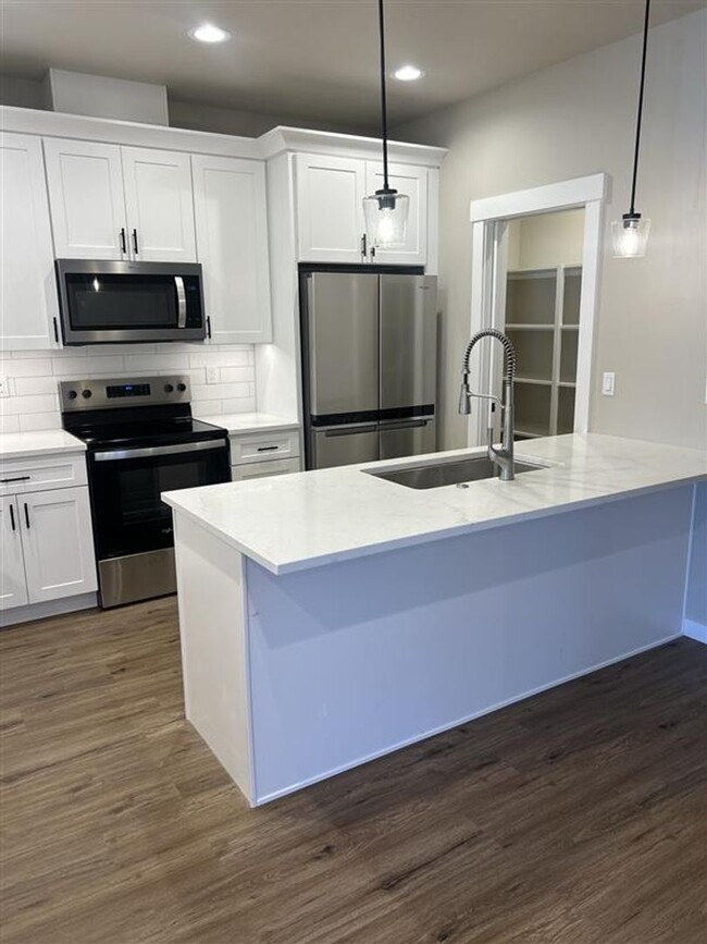 Building Photo - Brand New Construction Three Bedroom Condo...