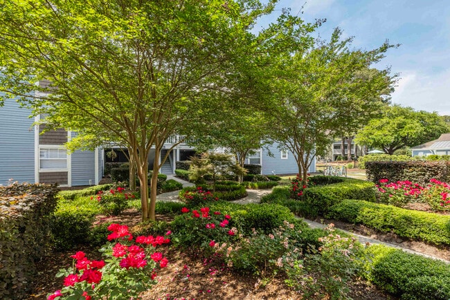 Garden Area Between Buildings - Village Green Apartment Homes