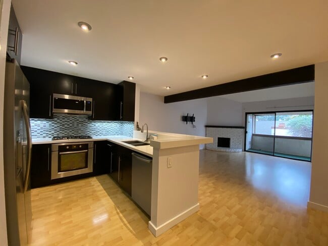 Kitchen and main living area. - 15155 Sherman Way