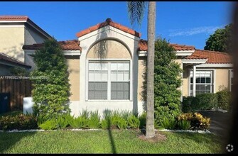 Building Photo - 5596 NW 102nd Ct