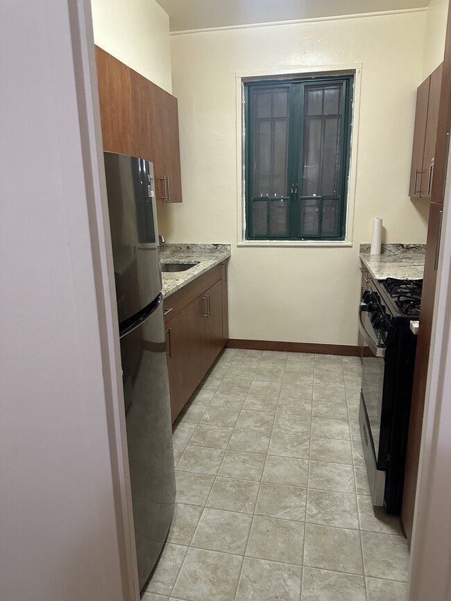 Freshly Renovated Kitchen Plenty of Cabinets - 1680 Metropolitan Ave