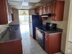 Building Photo - 3120 N Pine Island Rd