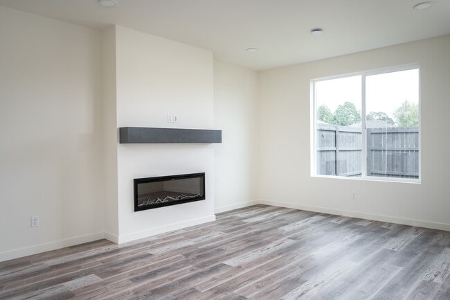 Electric fireplace in livingroom - 1965 NW 19th Ct
