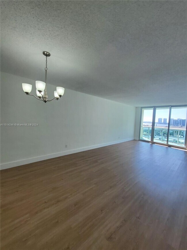 Building Photo - 19380 Collins Ave