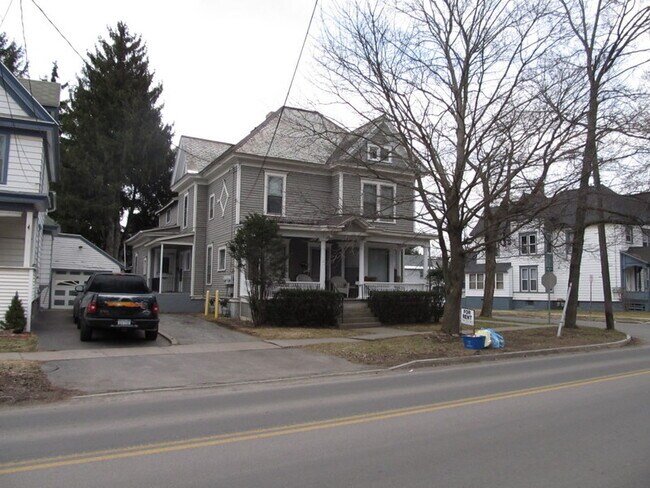 Apartment and driveway on left side - 39 Homer Ave