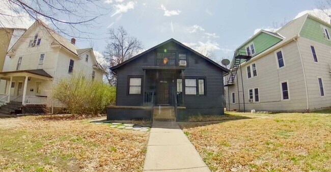 Building Photo - Updated Kitchen + Fenced-in Yard + Pet Fri...