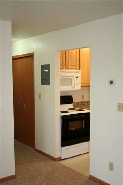 Kitchen/Hall - Wood Creek Apartments