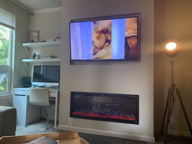 New fireplace and built-in TV system. Also nook on the left used as office - 615 6th St