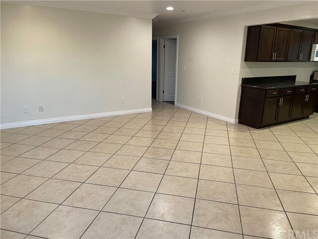 Foto del edificio - 7118 S Denker Ave