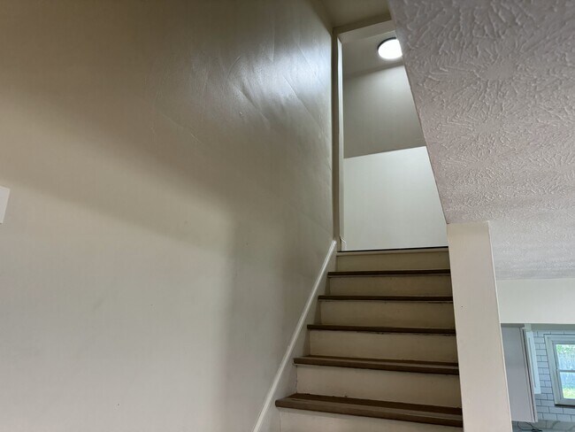 Stairwell to attic bedrooms - 998 Republic Ave