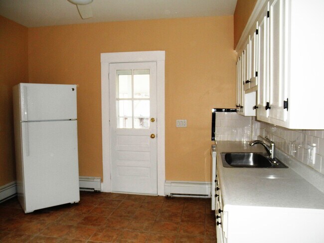 kitchen back door & Fridge - 129 Brown St