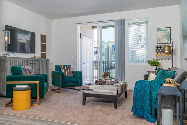 1x1 Deluxe l Model Living Room + Balcony - 1500 Orchard Apartments