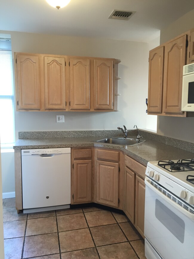 Kitchen - refrigerator on opposite wall - 941 Boulevard E