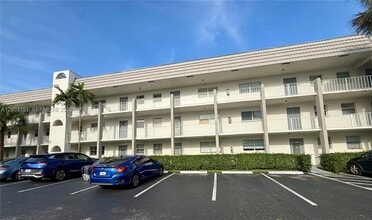 Building Photo - 8590 Sunrise Lakes Blvd