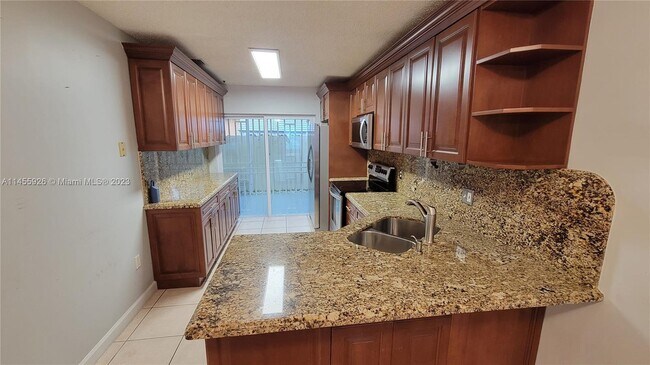 Foto del edificio - 9061 NW 119th Terrace