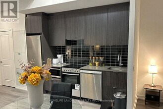 Building Photo - 395 Bloor St E