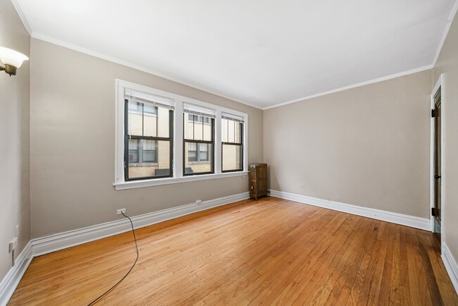 Building Photo - Sunny, Convertible Studio with Two Rooms a...