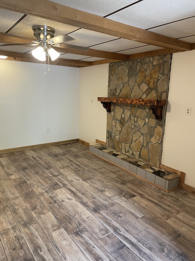 Living Room With New Vinyl Plank Flooring - 1 Division St