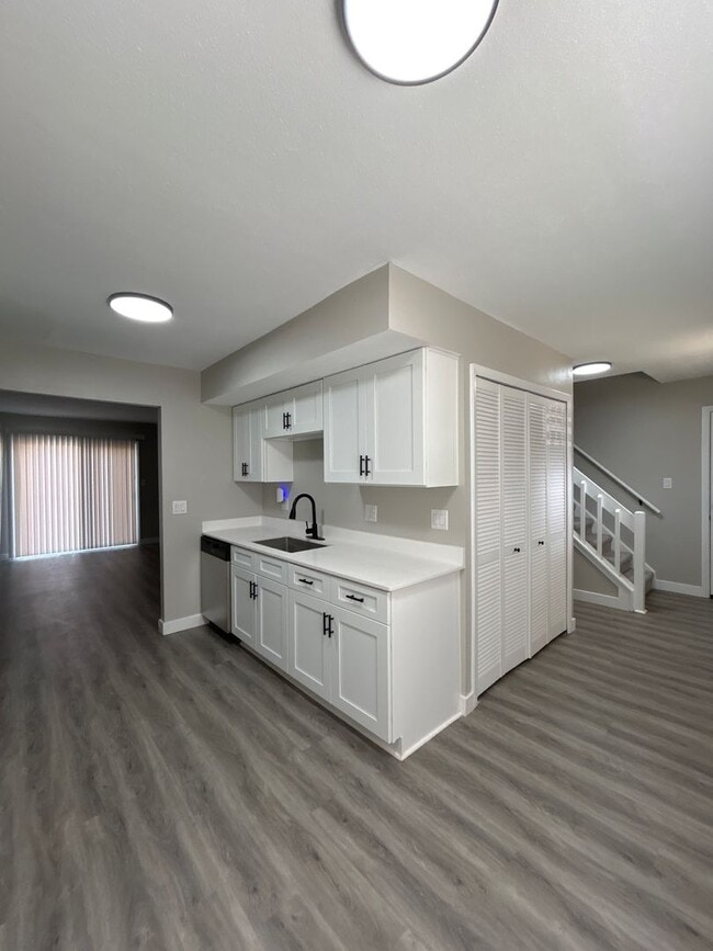 Building Photo - Beautifully Redone 3-Bedroom, 1.5-Bathroom Condo with Attached Garage – $1,725/Month (Lawn Care &...