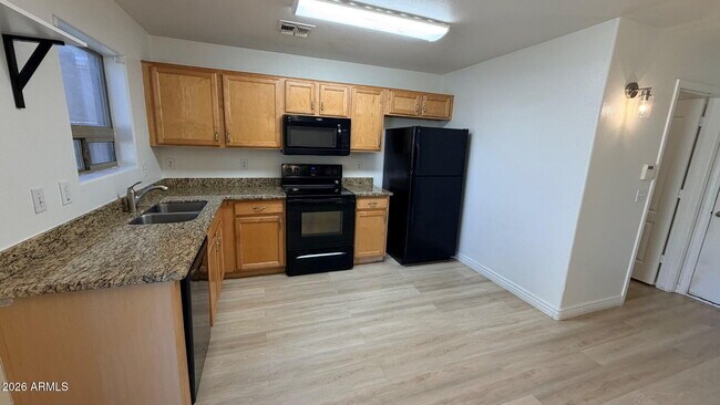 Building Photo - 41716 W Sunland Dr