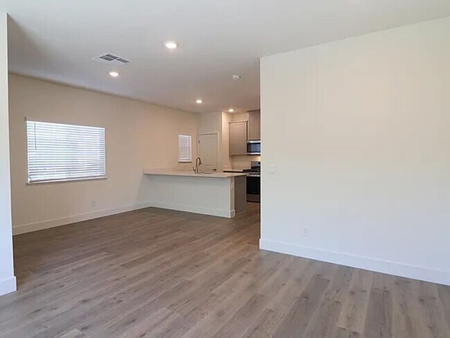 Building Photo - BRAND NEW - GRANITE - STAINLESS - LVP - CE...
