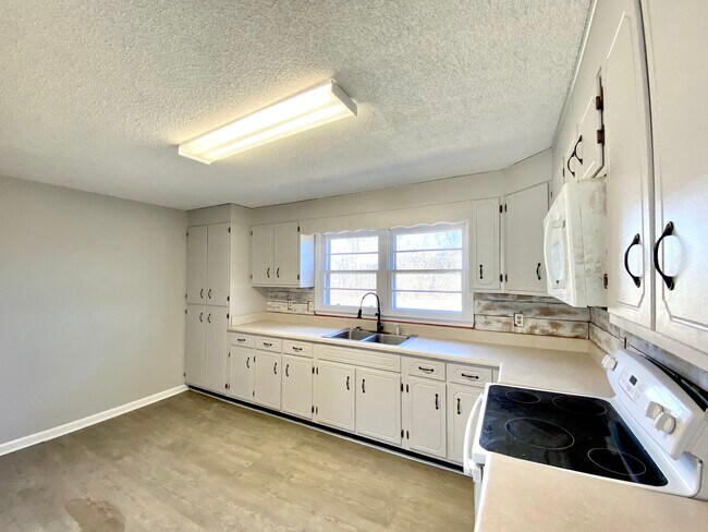 Tons of cabinets and work space - 1120 Dennis Ave