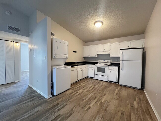 Building Photo - Updated 2BR, 1BA Apartment Off Old Palafox Hwy with LVP Flooring Throughout, Vaulted Ceilings & W...