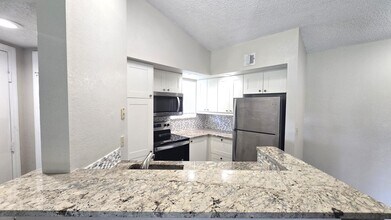 Building Photo - 3400 Pinewalk Dr N