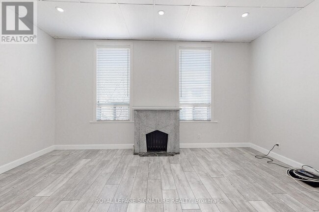 Building Photo - 741 Queen St E