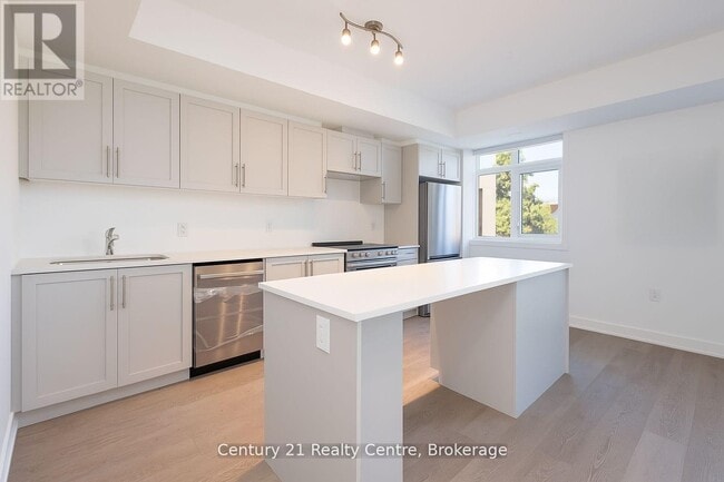 Building Photo - 1115 Douglas McCurdy Cmn