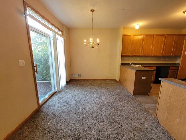 Building Photo - 2 BEDROOM, 1.1 BATH TOWNHOME AND TWO CAR G...