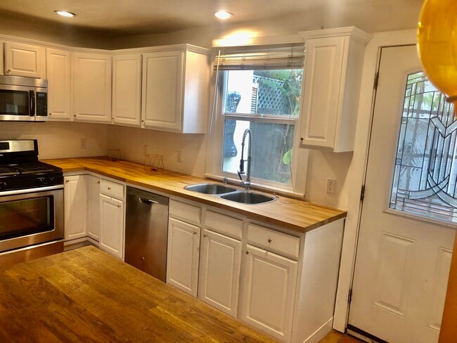 Remodeled kitchen w/butcher block countertops - 6107 Saturn St
