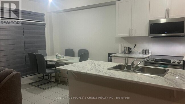 Photo du bâtiment - 48 Littlewood Dr