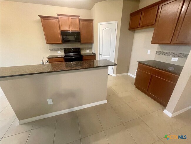 Foto del edificio - 7305 Buffalo Grass Dr