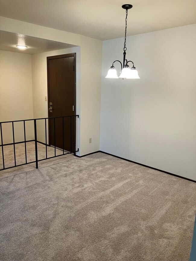 Inside unit with front door - 11300 1st Ave NE