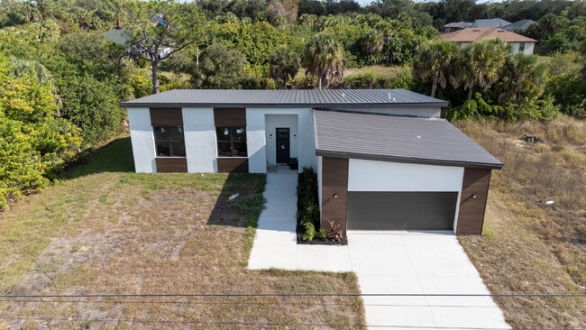 Building Photo - Brand New Construction 3/2  Canal Front Home for Rent in North Port
