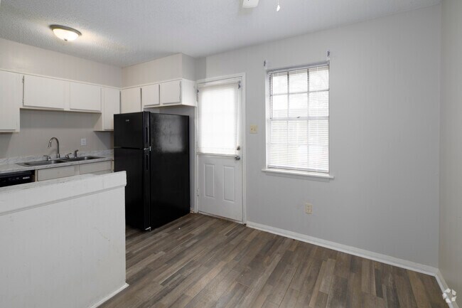 ¡Área de comedor - Camelot Apartments and Townhomes