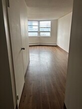 Building Photo - 825-828 8 Ave SW