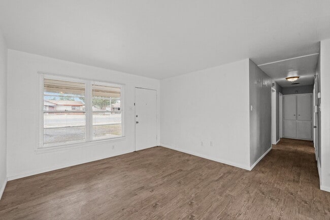 Building Photo - Updated Home with Gorgeous Floors & Large Backyard